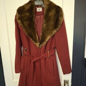 Worthington burgundy wrap coat with faux fur collar.